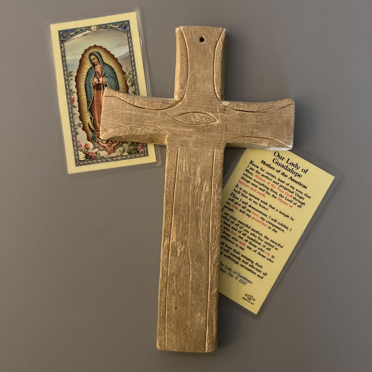 wooden cross and prayer card.