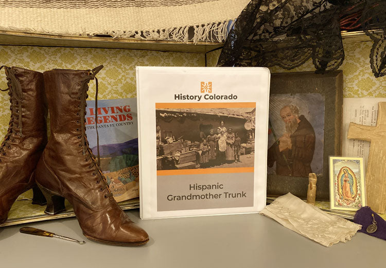 collage inclding antuque womens leather dress boots, retablo, lace veil, wooden cross, and teacher manual for Hispanic Grandmother Trunk