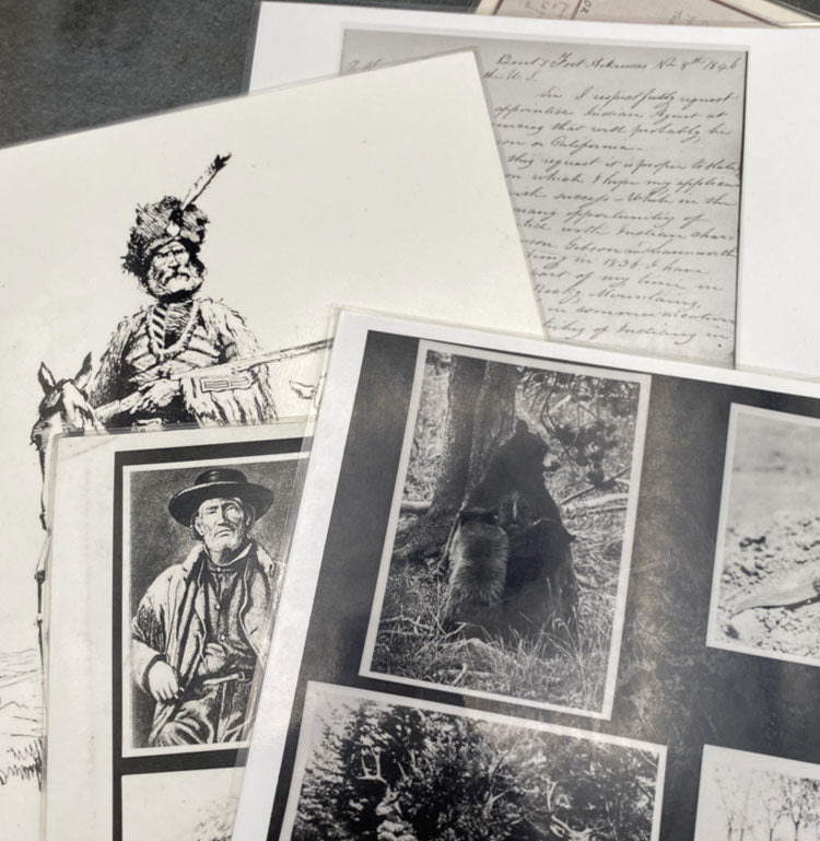 Collage of papers with drawings of Mountain men, hand written letters, and photograph of a bear.